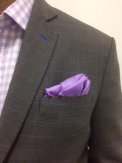 Grey checked jacket with purple accents testimonials